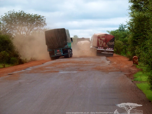 Lorries dodging potholes