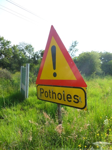 At least they warn of potholes with signs