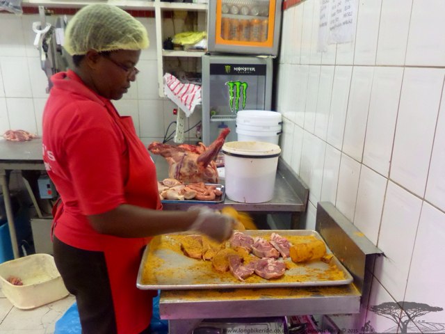Chops being seasoned at Mzoli's